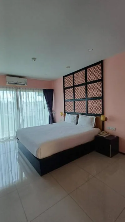 Camera Matrimoniale Deluxe con Balcone — Phuket Chinoinn-SHAPlus Certified